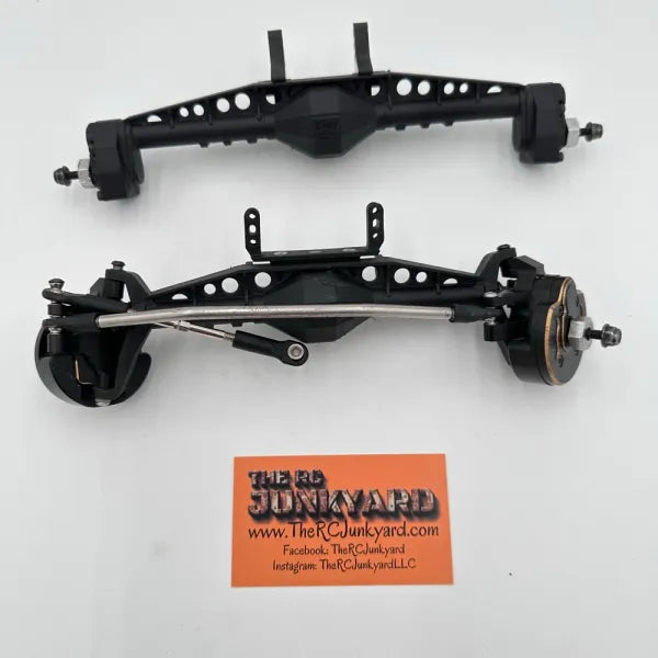 Capra Axles w/Steering Links, Rear carbon Fiber Link Risers, and Brass Inner & Outer Portal Covers