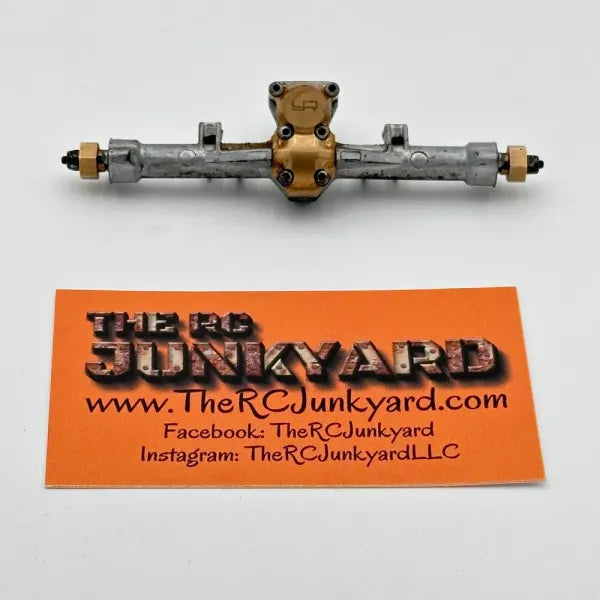 Axial SCX24 Plastic Rear Axle (Painted Silver) w/Brass Hexes & Yeah Racing Brass Diff Cover