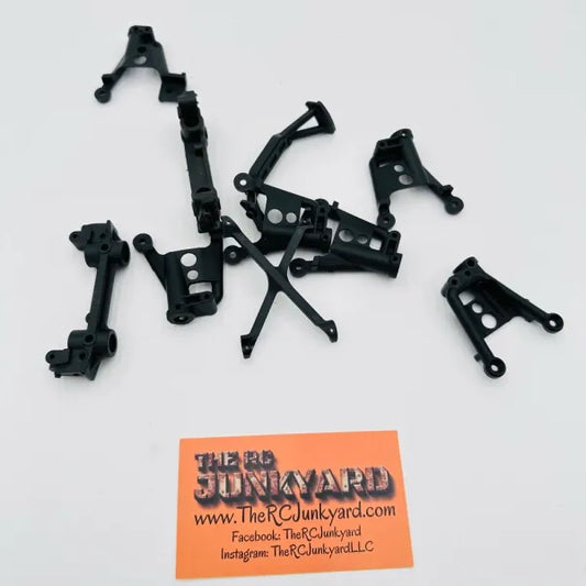 Miscellaneous Chassis Brace & Shock Tower Lot